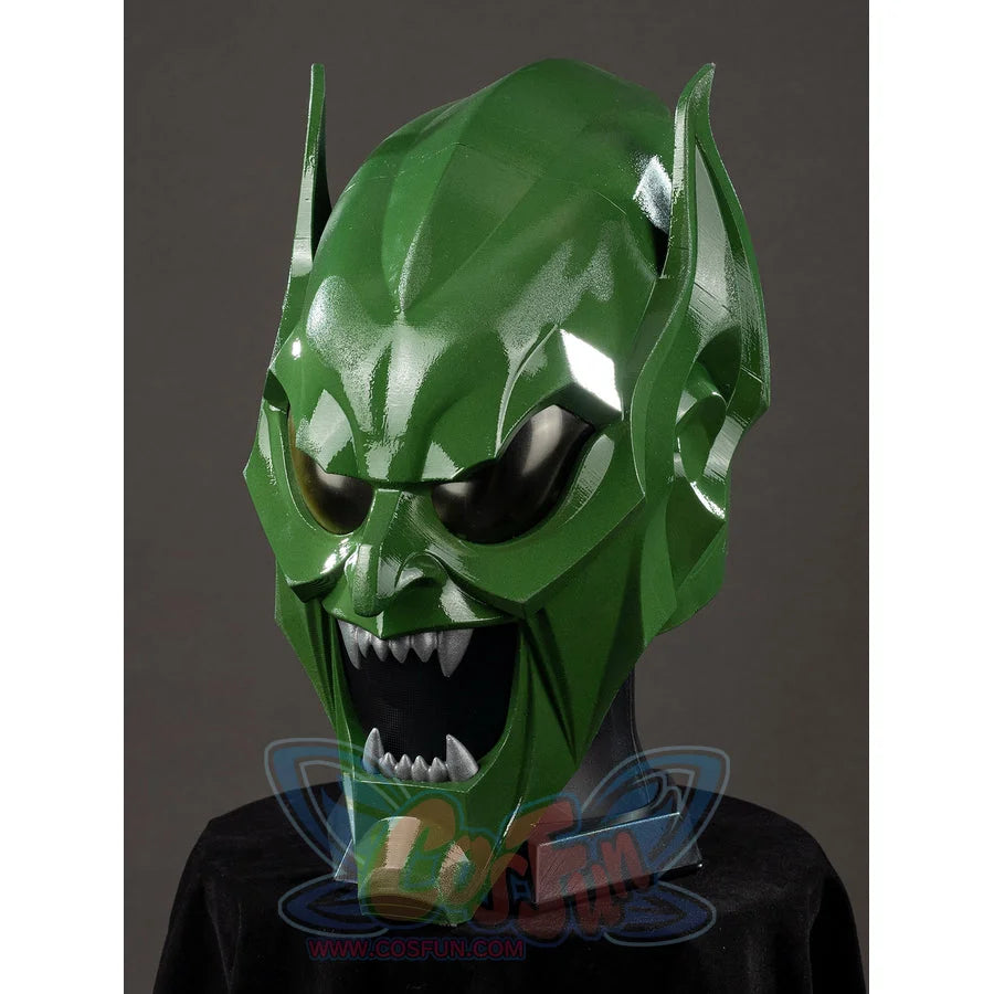 Green Goblin Norman Osborn cosplay helmet three-quarter view angles sharp teeth under glossy green cheek plates.