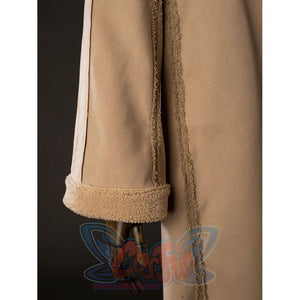 Grogu cosplay costume layers tan woolen fabric with sherpa fleece cuffs and textured frayed seams along the robe sleeve.