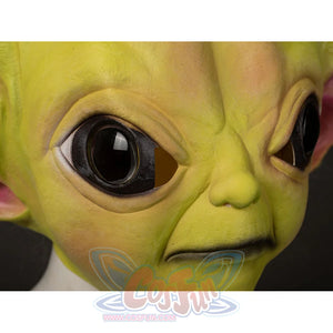 Grogu cosplay headpiece and claws curves around the face with realistic skin texture and large glossy black eye openings.