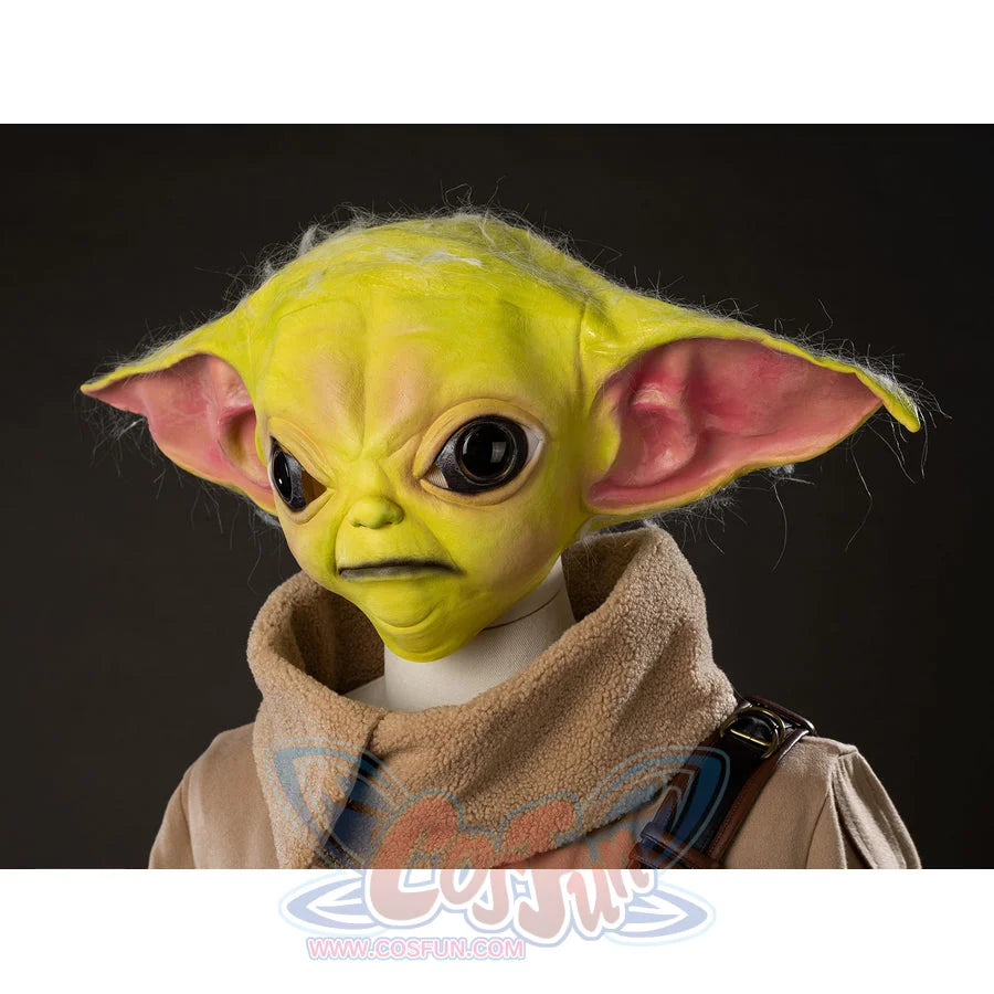 Grogu cosplay headpiece and claws curve around the face with realistic painted skin texture and fine wispy hair strands.