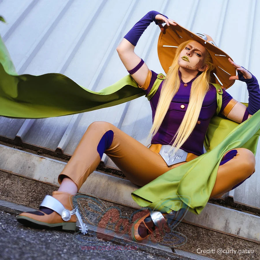 Anime Gyro Zeppeli cosplay costume spreads the green cloak around a seated purple top and tan pants look.
