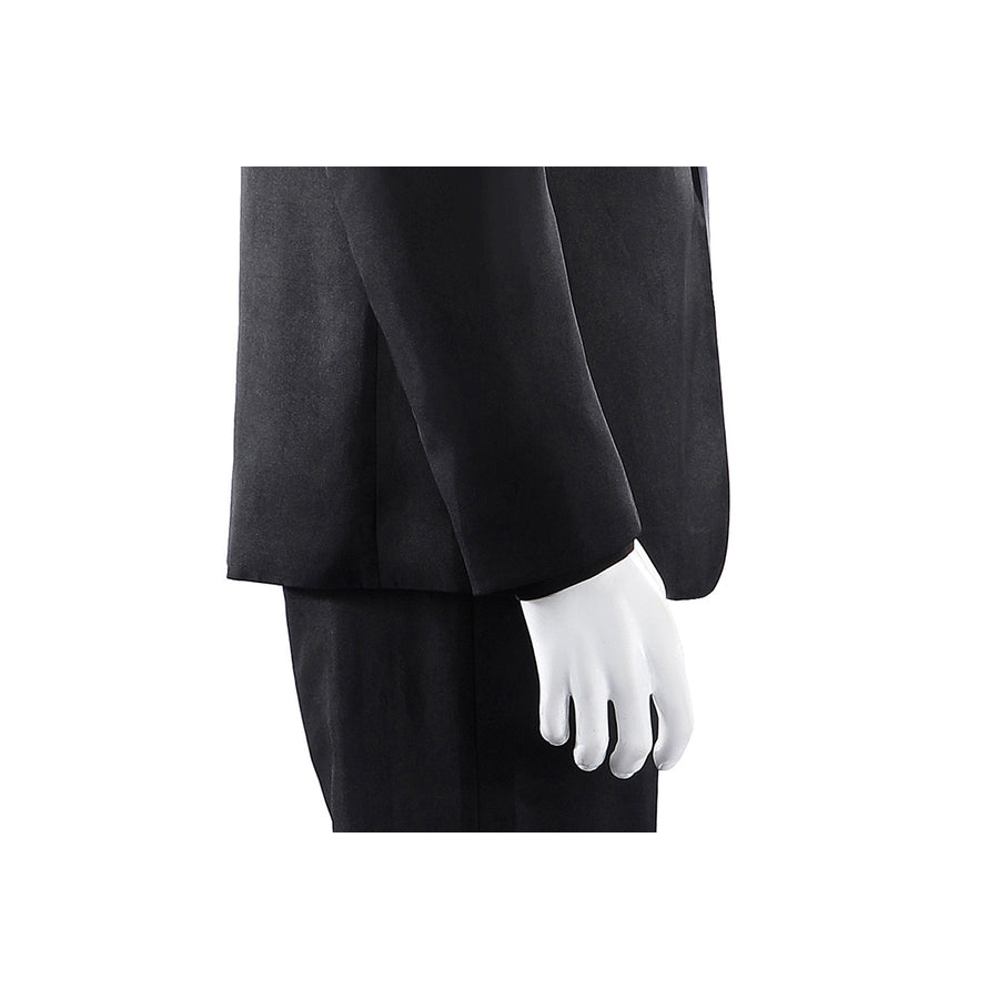 Harvey Dent Two-Face cosplay sleeve detail drops a black cuff beside the matching dark trouser leg.