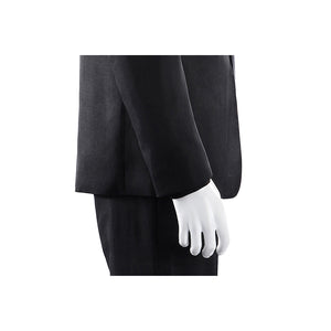 Harvey Dent Two-Face cosplay sleeve detail drops a black cuff beside the matching dark trouser leg.