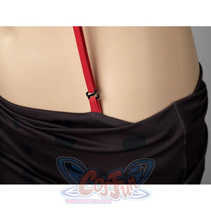 Hazbin Hotel Husk cosplay swimsuit detail anchors a red side strap beside the black skirt wrap.