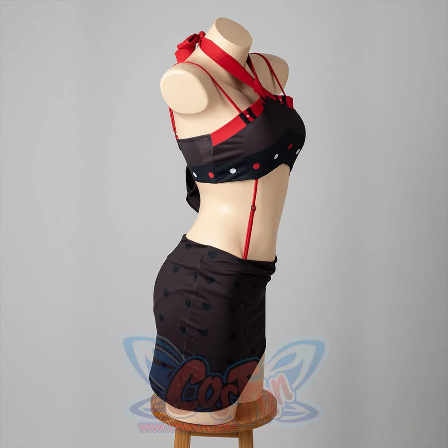 Hazbin Hotel Husk cosplay swimsuit side view arcs red shoulder straps above the black wrapped skirt.