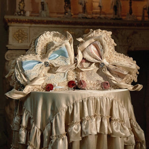 COSFUN Rococo heart cake handbags with blue and pink bows on a cream table