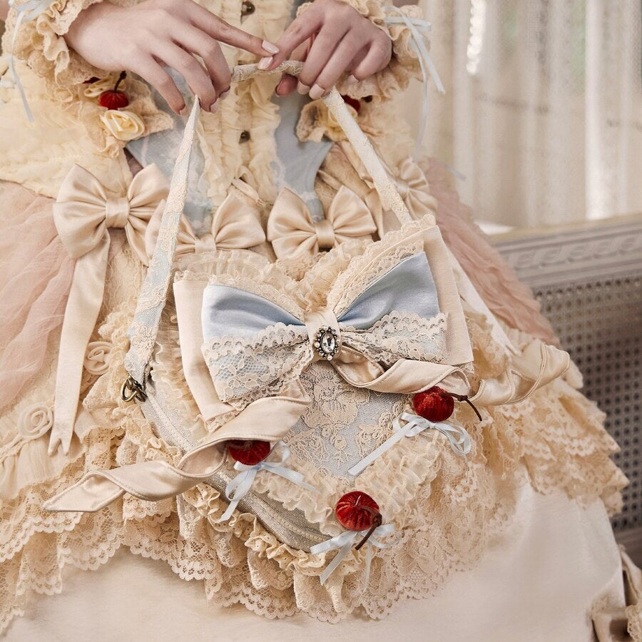 Heart cake handbag styled with a cream Rococo coordinate and bow accents