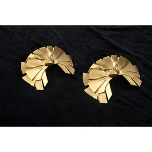 Gold shoulder armor pieces for Homelander cosplay costume from The Boys displayed on black background