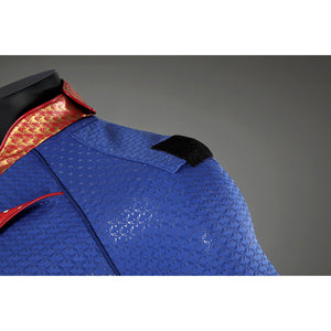 Close-up of Homelander cosplay costume shoulder attachment from The Boys on blue textured fabric