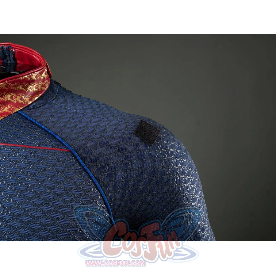 Homelander cosplay costume shoulder detail places a black attachment tab on blue scaled fabric.