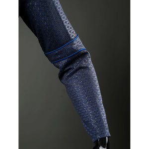 Homelander cosplay costume sleeve detail follows blue piping around the fitted forearm panel.