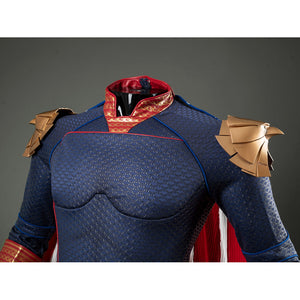 Homelander cosplay costume collar detail sets red patterned trim between blue piping and shoulder armor.