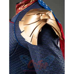 Homelander cosplay costume shoulder armor detail stacks gold-tone plates over the blue sleeve.