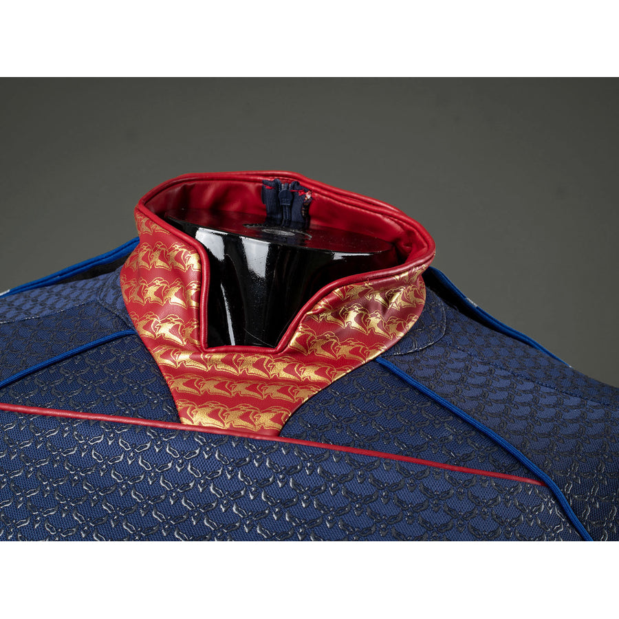 Homelander cosplay costume collar close-up layers red patterned trim above the blue scaled fabric.