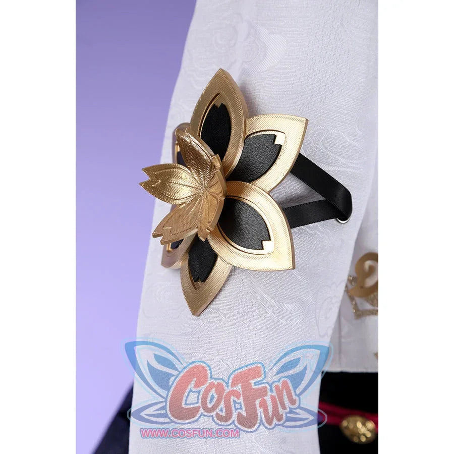 Honkai: Star Rail Evanescia cosplay arm accessory detail shows a gold-tone flower layered over white fabric