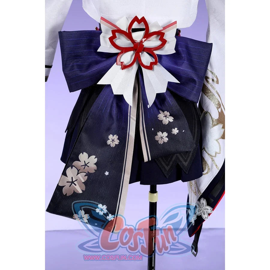 Honkai: Star Rail Evanescia cosplay back waist detail layers a purple bow beneath red and white floral shapes