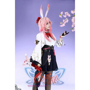 Honkai: Star Rail Evanescia cosplay costume side view shows a black skirt beneath white outerwear and gold trim