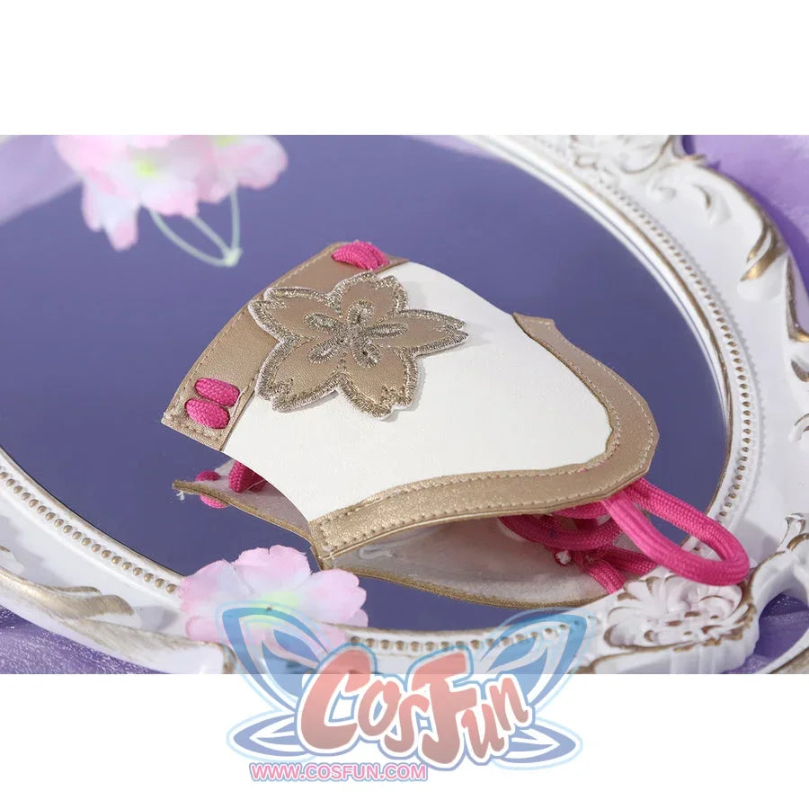 Honkai: Star Rail Evanescia cosplay cuff accessory flat lay shows a white panel edged by pink cords
