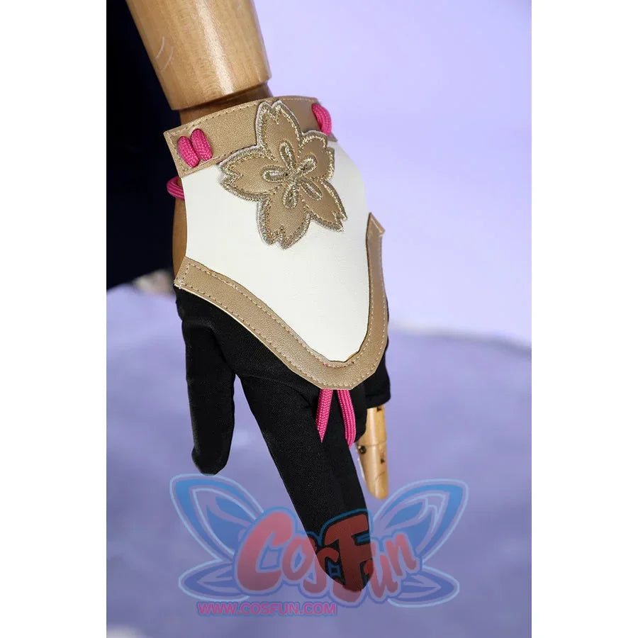 Honkai: Star Rail Evanescia cosplay arm accessory detail shows a gold-tone flower charm on white fabric