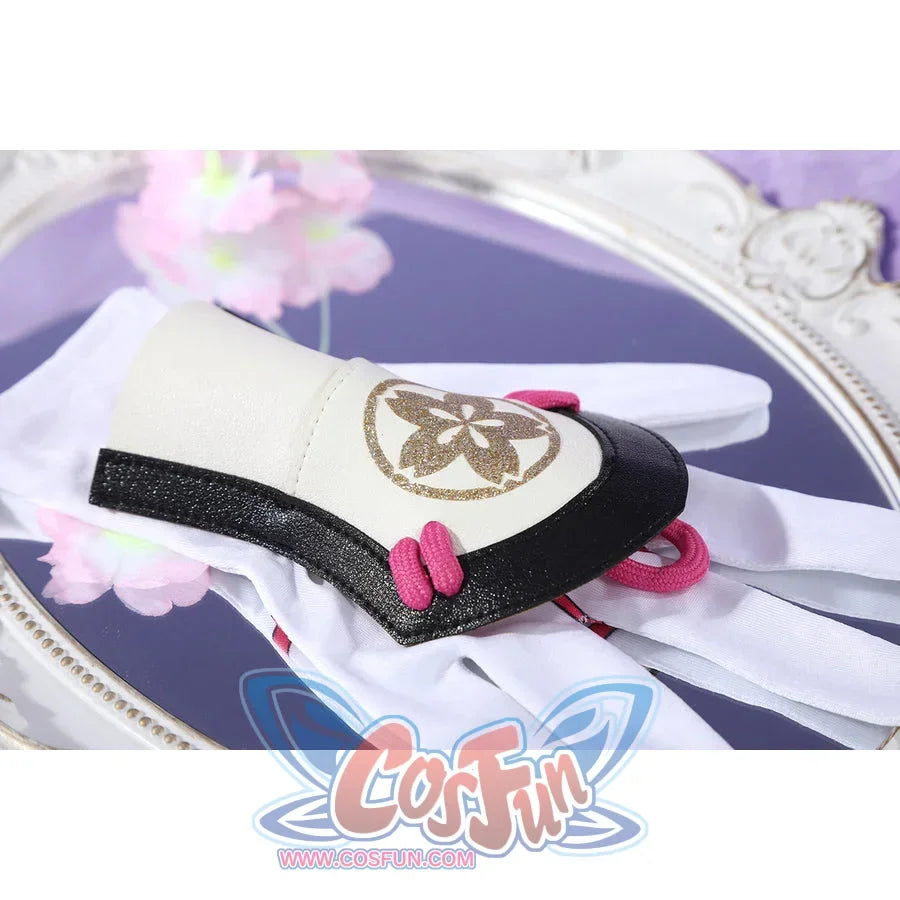 Honkai: Star Rail Evanescia cosplay folded arm accessory shows pink cords crossing white fabric with black trim