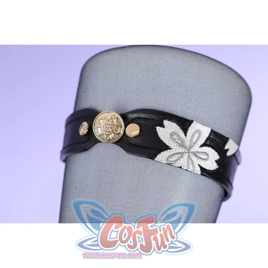 Honkai: Star Rail Evanescia cosplay leg ring detail wraps a black band with a white flower around sheer fabric