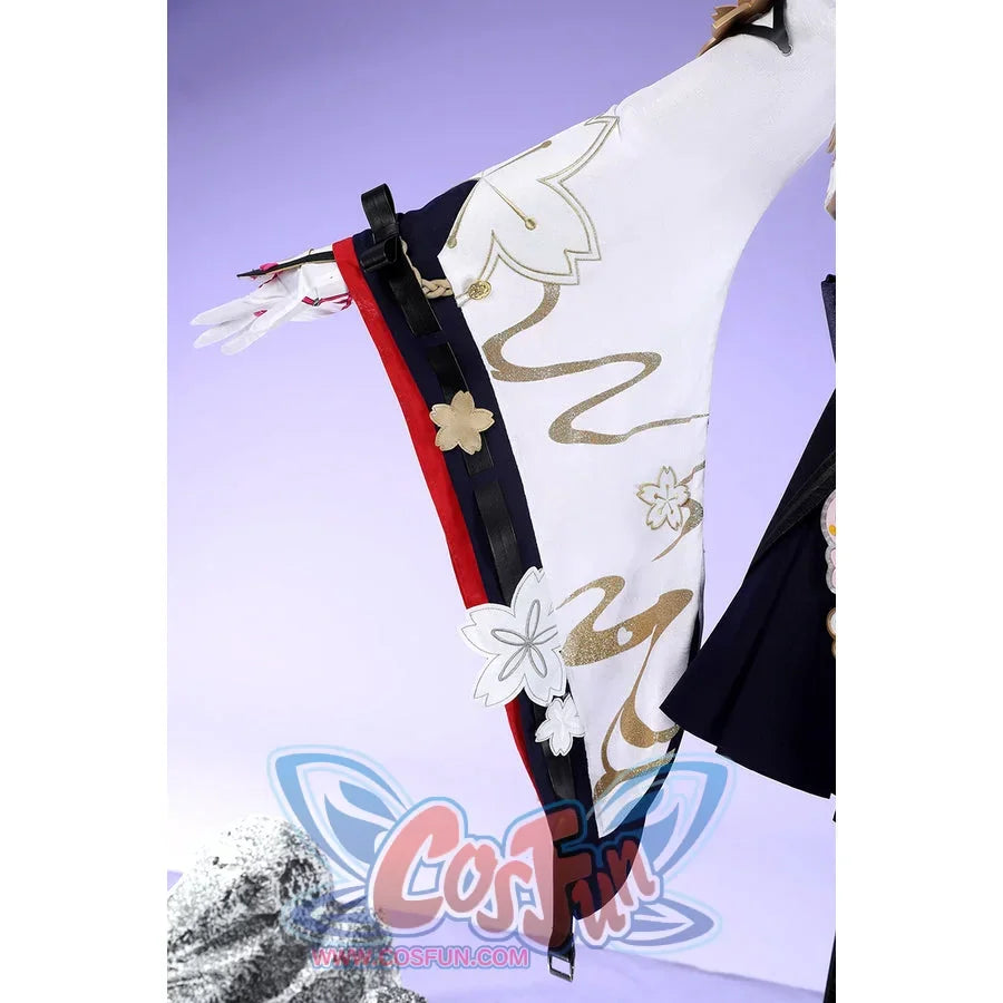 Honkai: Star Rail Evanescia cosplay sleeve hem detail shows white fabric edged by black and hot pink trim