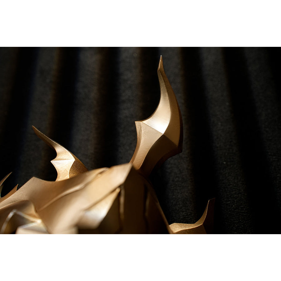 Honkai Star Rail Khaslana cosplay shoulder armor detail highlights the curved gold-tone spike