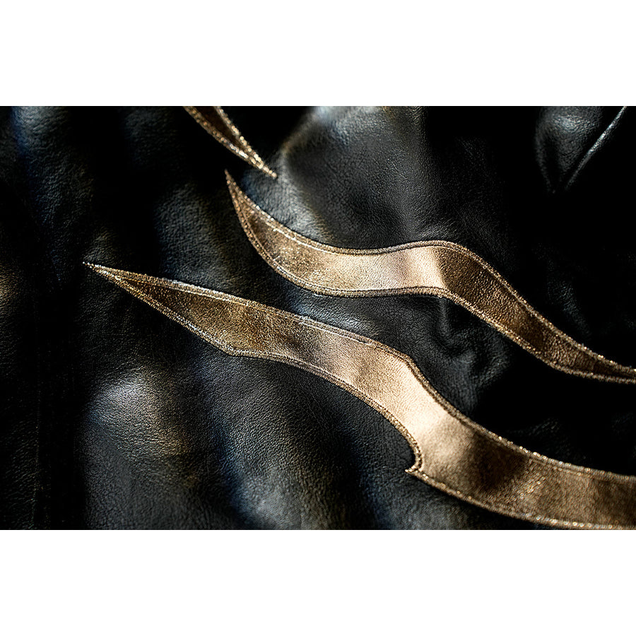 Honkai Star Rail Khaslana cosplay coat trim close-up shows flowing gold bands over black fabric