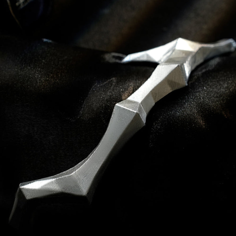 Honkai Star Rail Khaslana cosplay silver arm armor close-up shows an angular blade-like shape