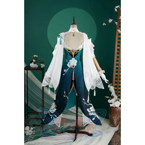 Honkai: Star Rail Ruan Mei cosplay costume gathers the open back, white shawl, and dark teal rear skirt panels.