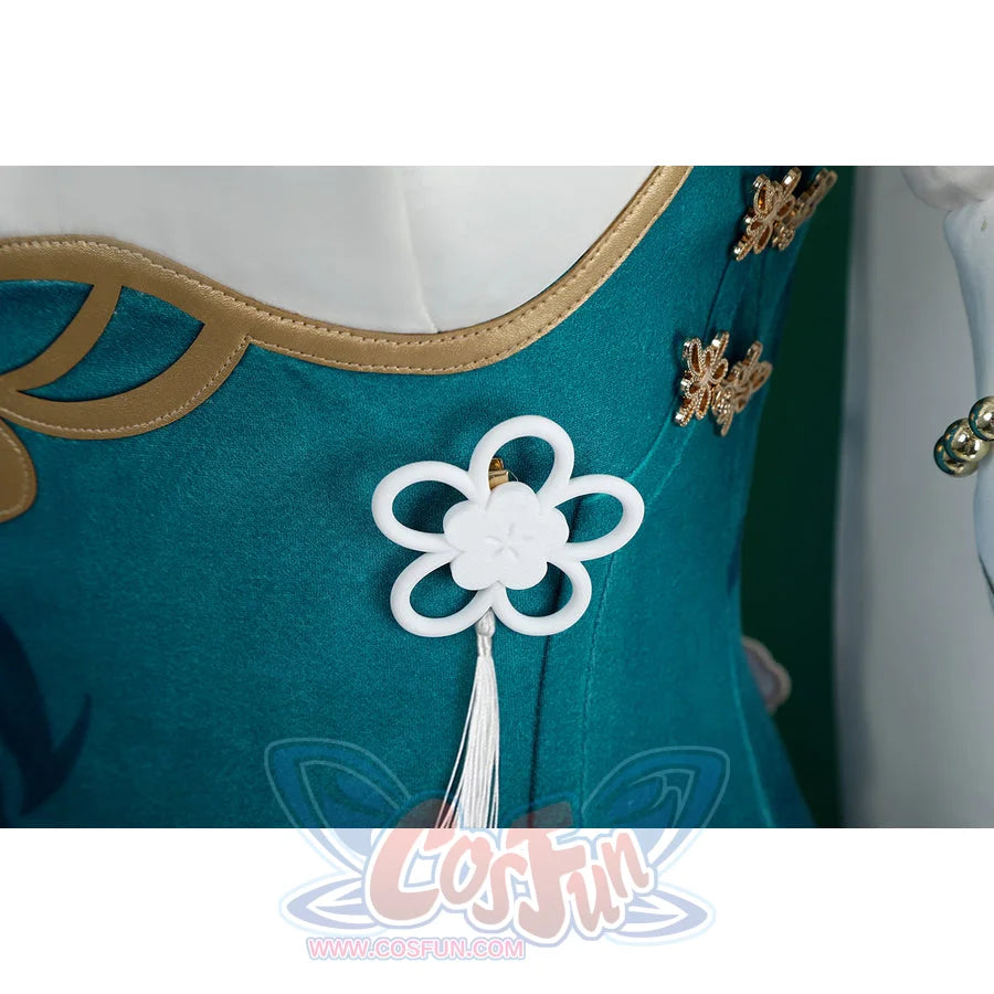 Honkai: Star Rail Ruan Mei cosplay costume bodice detail centers a white flower knot and tassel over teal fabric.