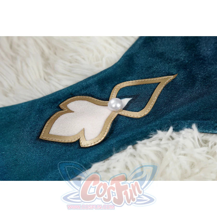 Honkai: Star Rail Ruan Mei cosplay costume ear clip detail places gold tassels and pearl accents over teal fabric.