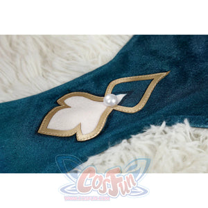 Honkai: Star Rail Ruan Mei cosplay costume ear clip detail places gold tassels and pearl accents over teal fabric.