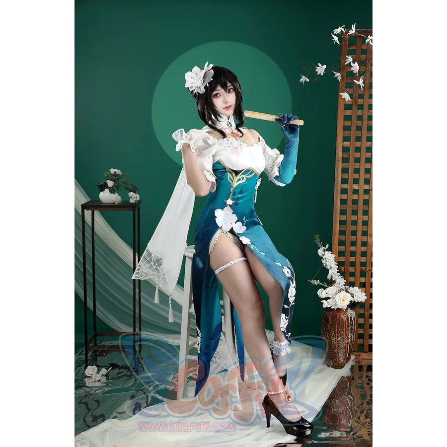 Honkai: Star Rail Ruan Mei cosplay costume frames a teal dress, high slit, and white shawl in a full front pose.