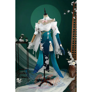 Honkai: Star Rail Ruan Mei cosplay costume balances the white shoulder shawl against split teal skirt panels.