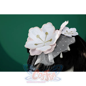Honkai: Star Rail Ruan Mei cosplay costume headband detail lines pearl beads along the dark hairpiece.