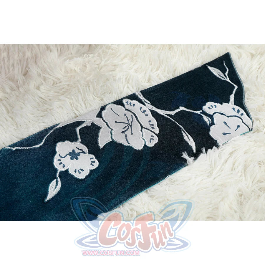 Honkai: Star Rail Ruan Mei cosplay costume flat-lay hem detail pairs dark teal fabric with white lace edging.