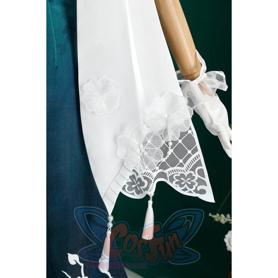 Honkai: Star Rail Ruan Mei cosplay costume shawl detail lets white lace and tassels fall from the sleeve edge.