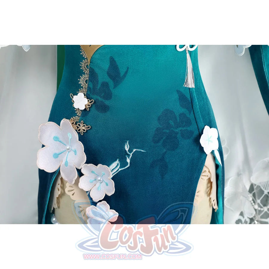 Honkai: Star Rail Ruan Mei cosplay costume side panel detail places white blossoms over teal fabric and pale lace.
