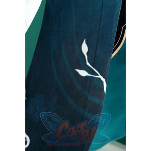 Honkai: Star Rail Ruan Mei cosplay costume teal fabric detail highlights a pale branch motif across the skirt panel.
