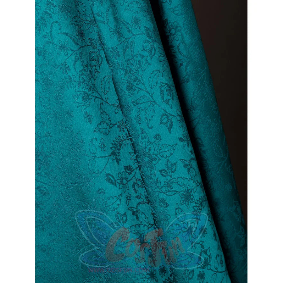 House of the Dragon Alicent Hightower cosplay cloak fabric detail carries a subtle floral pattern through teal folds