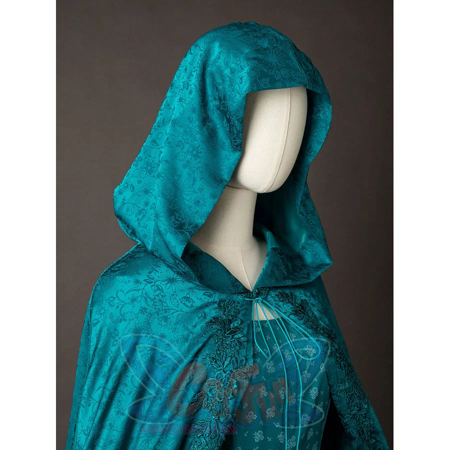 Alicent Hightower cosplay hood close-up frames the face opening with teal patterned fabric.