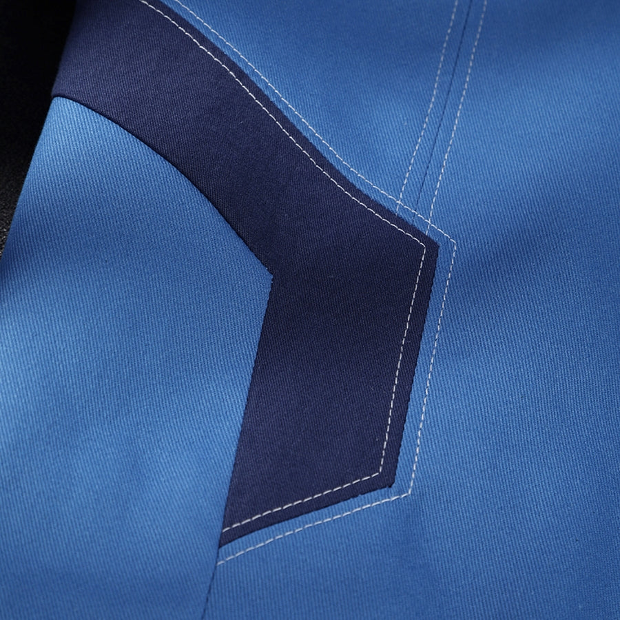 Human Torch Johnny Storm cosplay costume fabric layers blue twill panels secured by clean white decorative topstitching.
