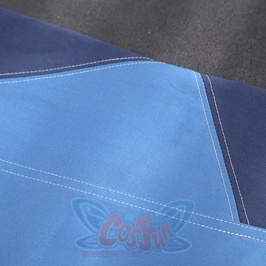 Human Torch Johnny Storm cosplay costume fabric layers light blue and dark blue sections beside clean white top stitching.