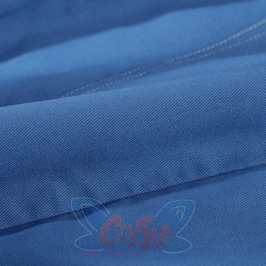 Human Torch Johnny Storm cosplay costume fabric close up reveals the dense weave of the durable blue cotton twill textile.