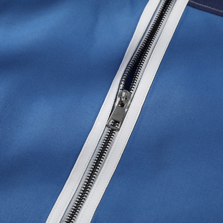 Human Torch Johnny Storm cosplay costume fabric layers blue cotton twill textured material under a silver-tone zip closure.