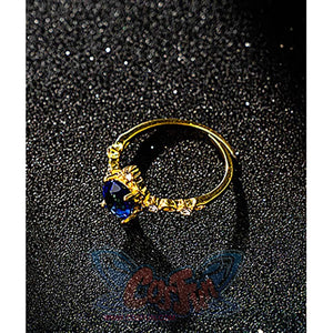 Identity V Truth & Inference Grace cosplay ring detail centers a blue gem-like accent in gold-tone metal.