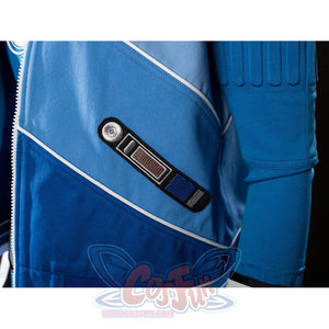 Invisible Woman cosplay costume jacket snap detail anchors a black tab against angled blue panels.