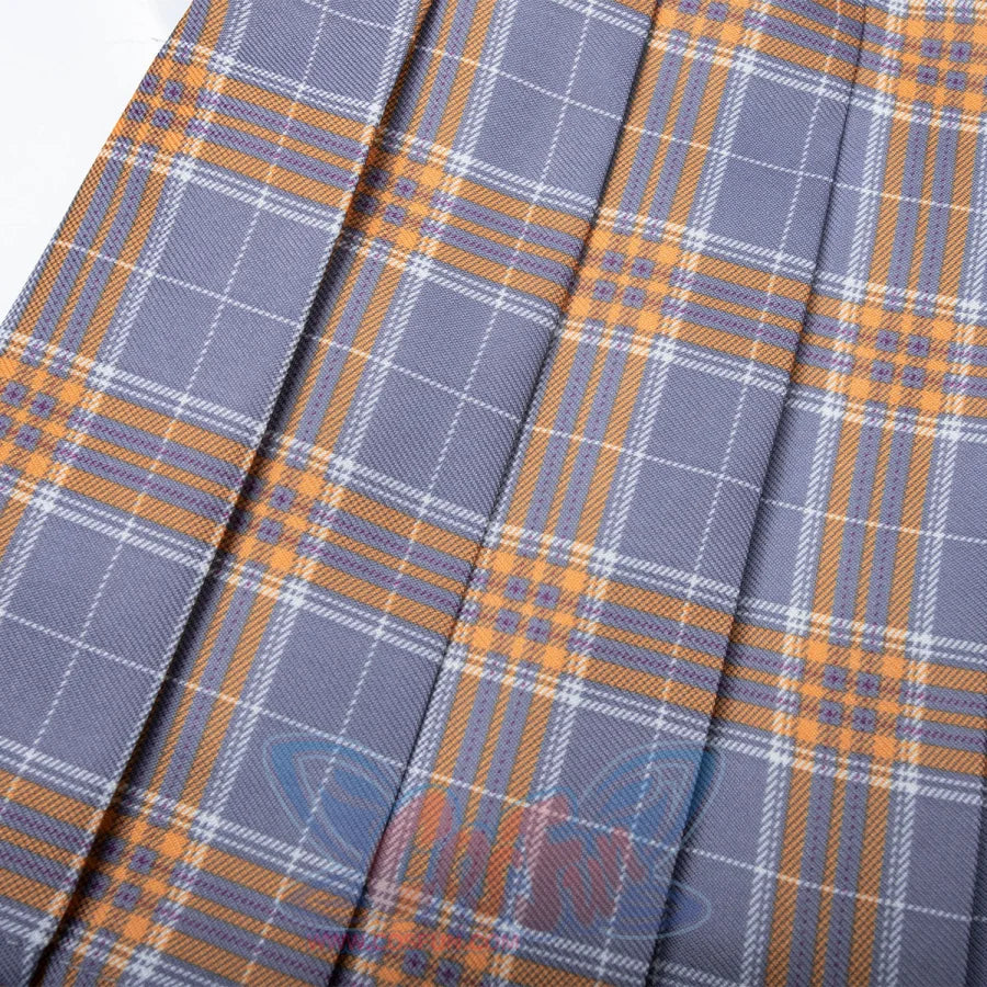 Plaid fabric detail on the JK skirt places yellow crossing lines over gray panels between deep pressed folds.