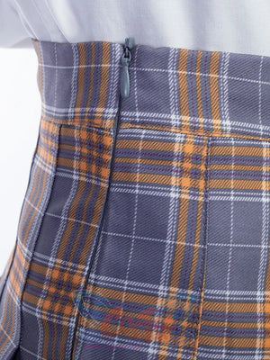 Side zipper detail on the JK plaid pleated skirt sits flush within gray-yellow check fabric and pressed folds.